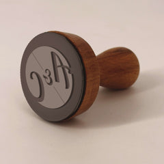 Tampon rond embossé